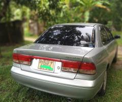 Nissan Sunny FB 15 Super Saloon - 1/5