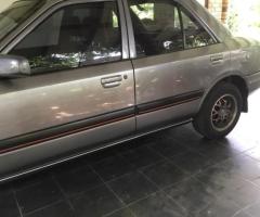 Mazda Familia 323 - 4/5